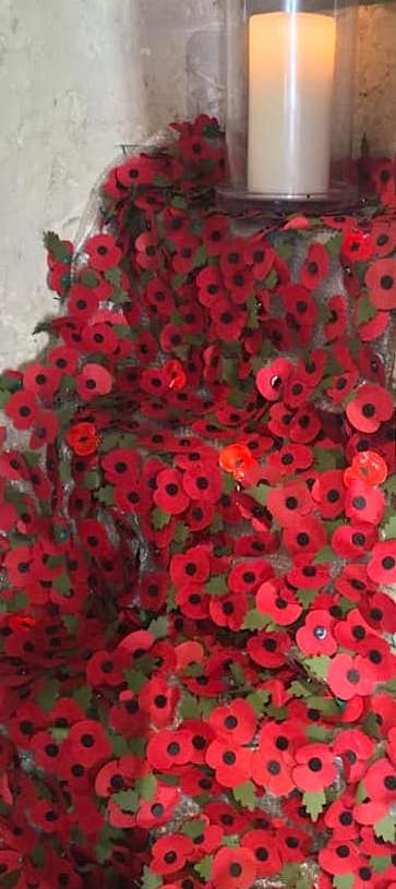 poppies and a candle